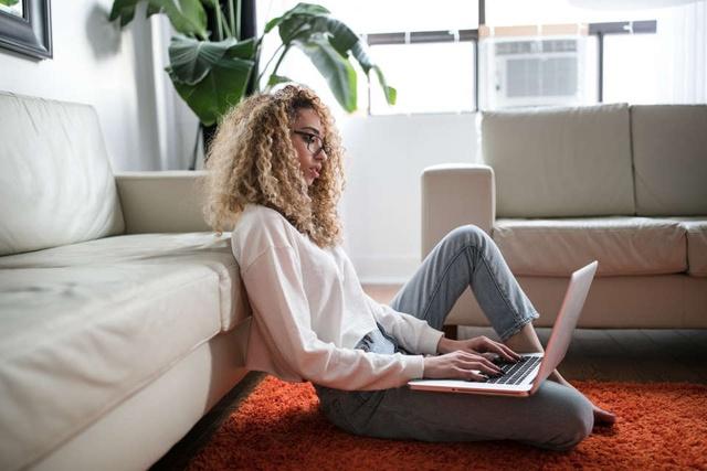 woman using technology with laptop